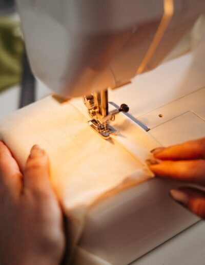 Person Sewing a Fabric